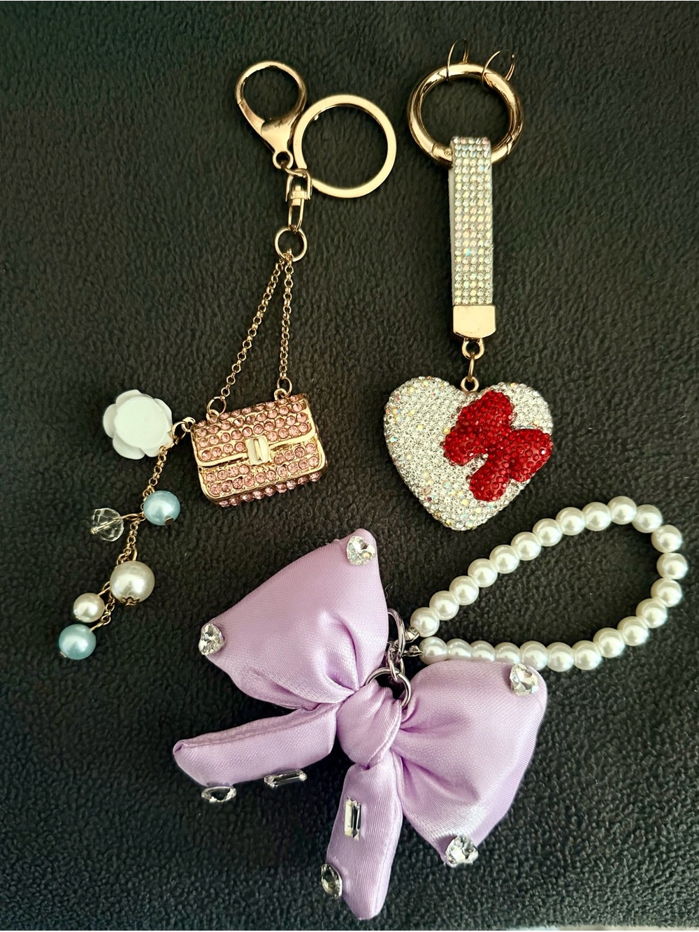 Rhinestone Pink Bag, Rhinestone Silver Heart with Bow and Purple Bow CP Wristlet